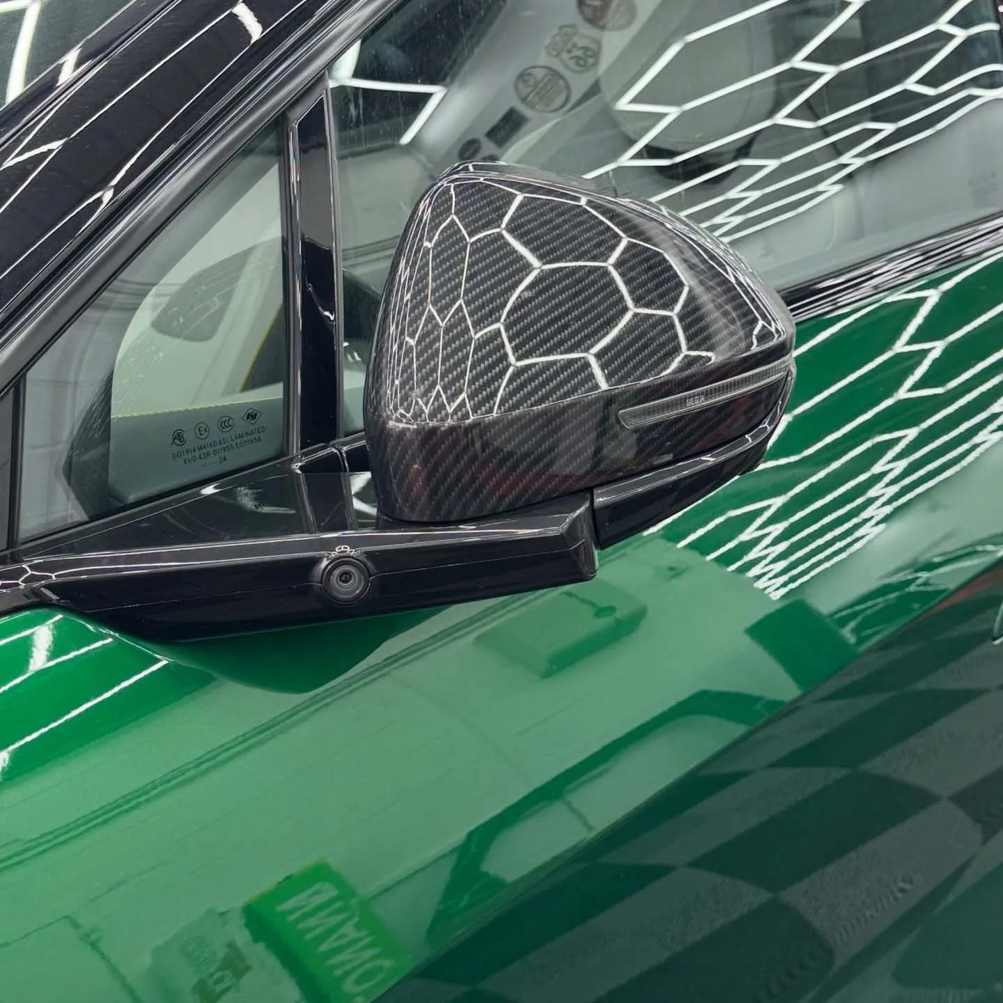 Close up of carbon fiber wing mirror